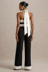 Caterina | Black & White Halter-Neck Wide-Leg Jumpsuit